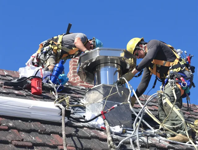 Protective chimney cap installed by Pineville Chimney Sweep in Pineville, NC