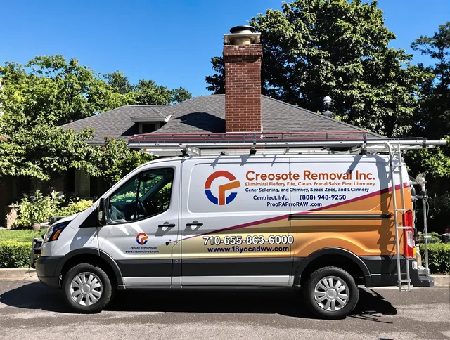 Pineville Chimney Sweep technician removing creosote safely in Pineville, NC